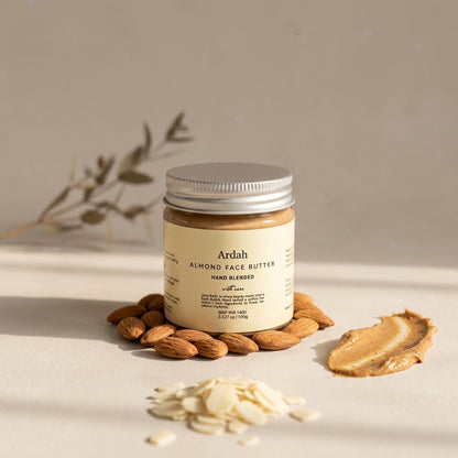 Ardah Almond Face Butter jar with almonds and almond slices on a neutral background