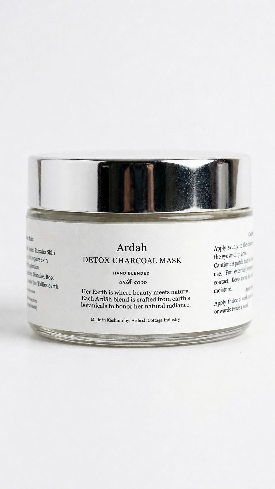 A jar of Ardah Detox Charcoal Mask cleanser with a white label and a reflective silver lid, set against a plain white background.