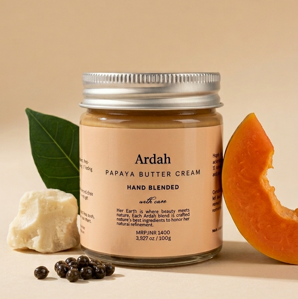 Jar of Ardah Papaya Butter Cream with papaya and leaves on a beige background